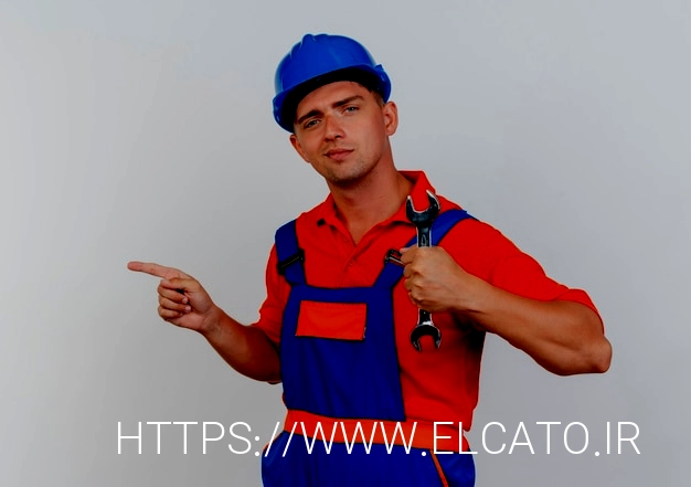 Free photo pleased young male builder wearing uniform and safety helmet holding wrench and points at side on white